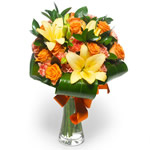 Bouquet di gigli, gerbere e rose arancio